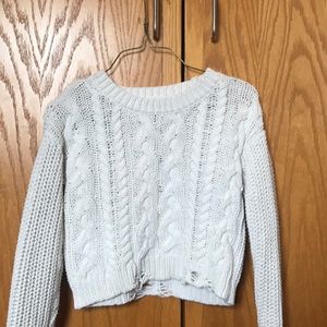 White distressed cable knit sweater